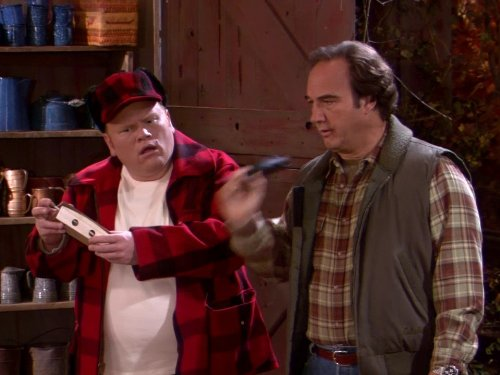 Man in red flannel shirt and hat, Jim in shirt and vest