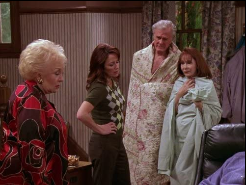 Marie and Debra look on at Debra's parents, post-coital. Dad is wrapped in bedspread, mom in sheet