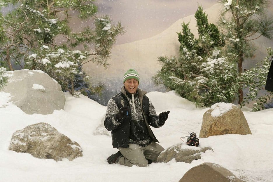 Joey(Matt LeBlanc) looks happy on a set full of fake snow