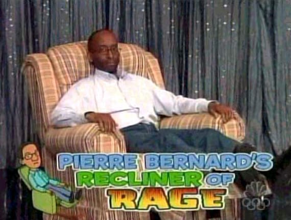 Pierre Bernard's Recliner of Rage (Pierre Bernard sits in his recliner, wearing white button up and jeans)